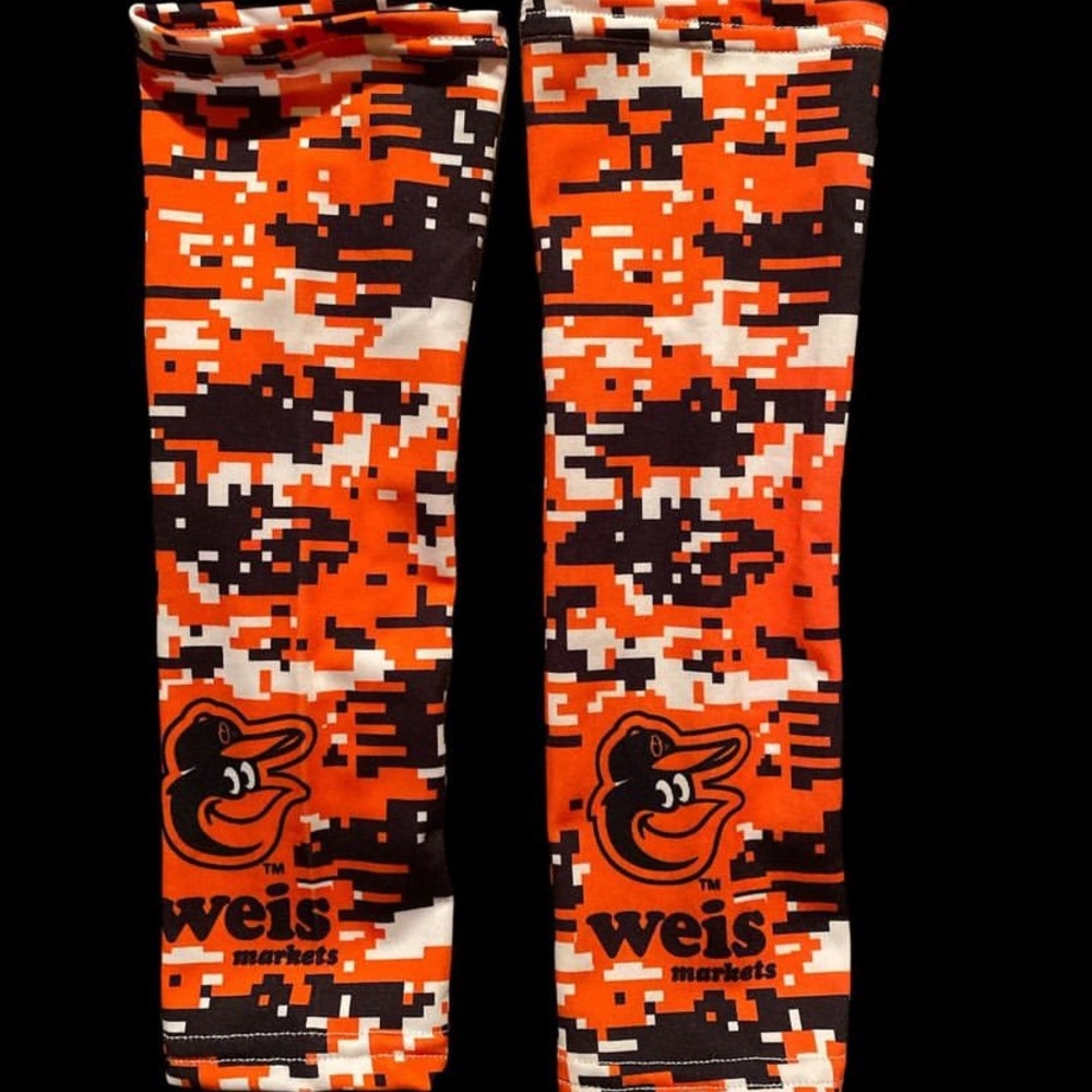 Baltimore Orioles drifit forearm shivers. Orange, black and white digi camo